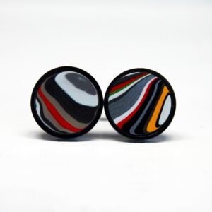 Colorful round earrings with abstract patterns.
