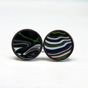 Colorful round earrings with abstract patterns.