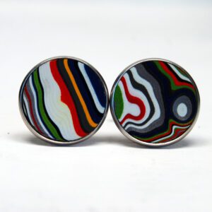 Colorful striped earrings on white background.