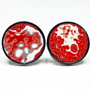 Red and white abstract pattern earrings.