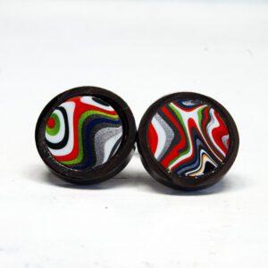 Colorful round earrings with abstract patterns.