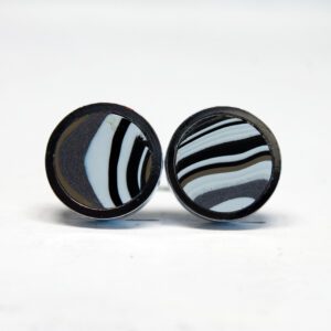Black and white striped round earrings.