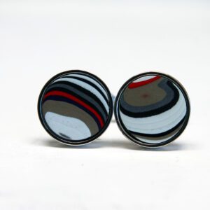 Colorful round cufflinks with striped pattern.