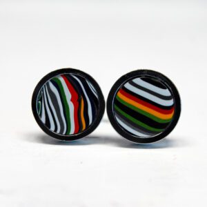 Colorful striped round earrings on white background.