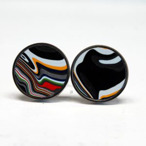 Round earrings with colorful abstract designs.