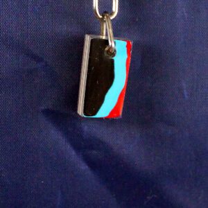 Colorful keychain on a dark background.