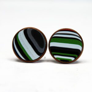 Striped round earrings on white background.