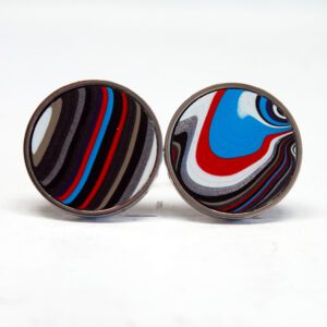 Colorful round earrings with abstract design.
