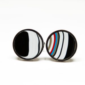 Round cufflinks with striped design.