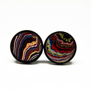 Colorful abstract patterns on two circular objects.
