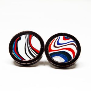 Circular earrings with colorful abstract patterns.