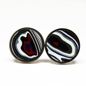 Colorful abstract patterned round earrings.