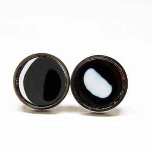 Two circular objects with contrasting patterns.