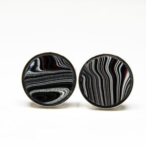 Black and white striped round earrings.