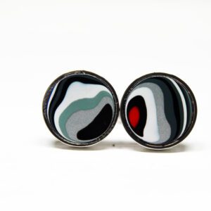 Round earrings with abstract colorful patterns.