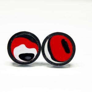 Colorful abstract round earrings on display.