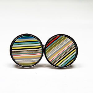 Colorful striped circular cufflinks on display.