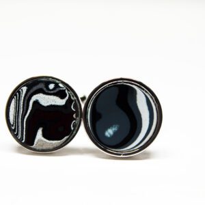 Black and white patterned round cufflinks.