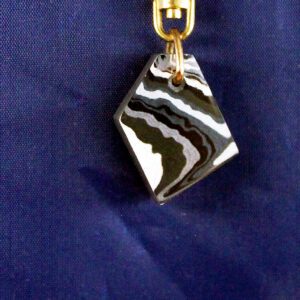 Black and white marbled diamond-shaped pendant.