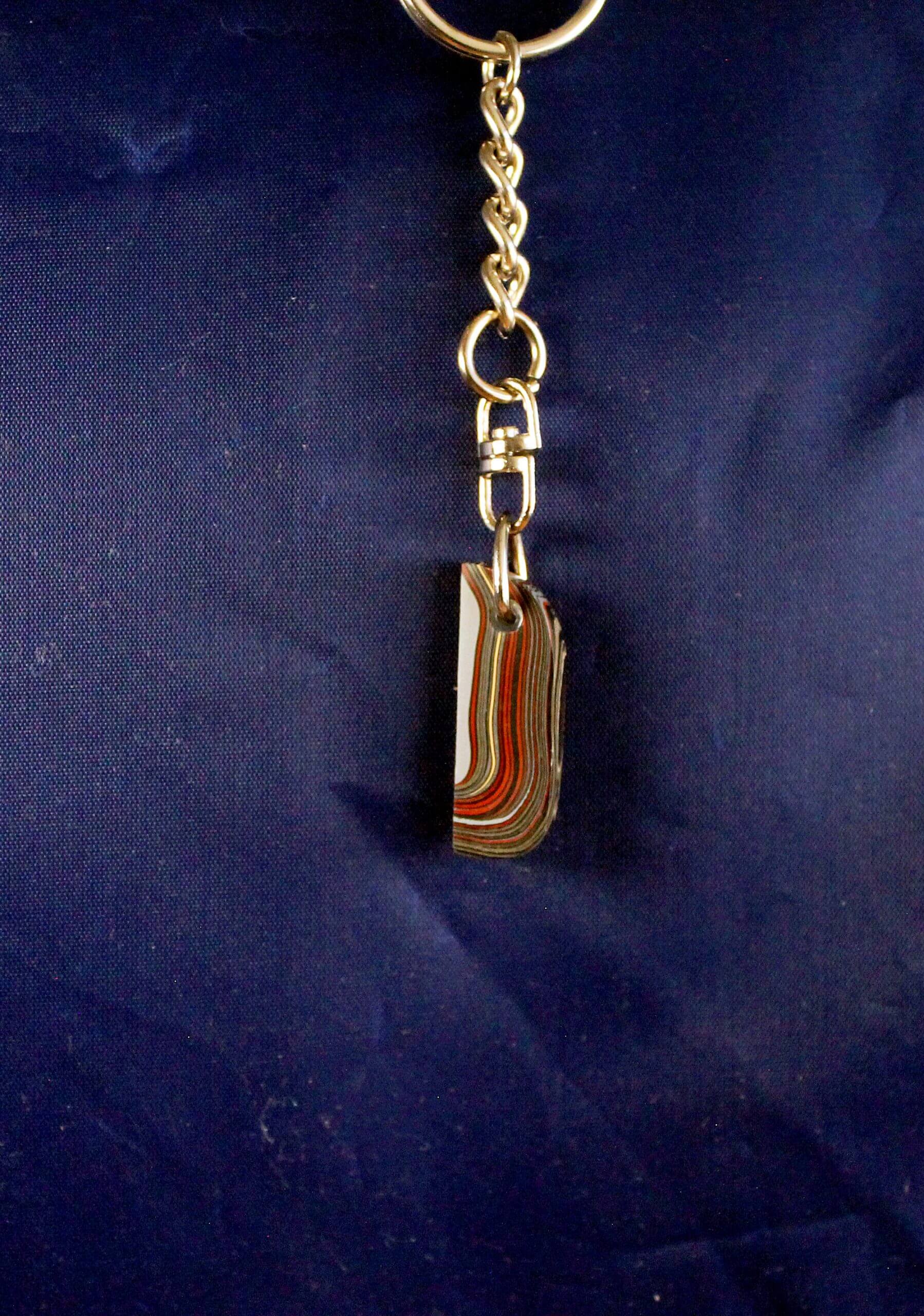 Keychain with small layered object attached.