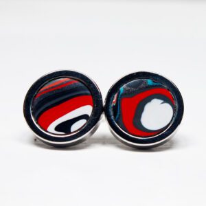 Red and black circular patterned cufflinks.