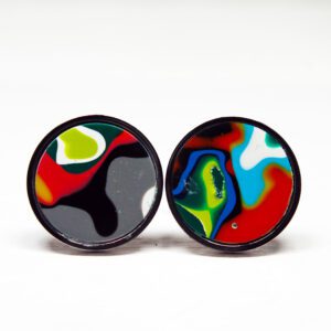 Colorful abstract circular earrings on display.