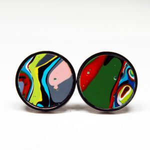 Colorful abstract design on round earrings.