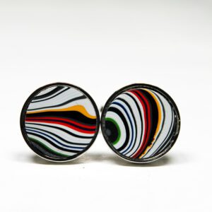 Colorful swirl pattern round earrings on display.