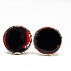 Circular earrings with black and red design.
