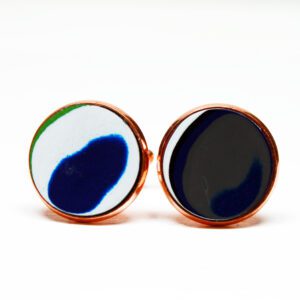 Colorful round earrings with abstract design.