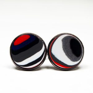 Colorful round cufflinks with abstract design.