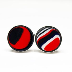 Red and black circular cufflinks design.