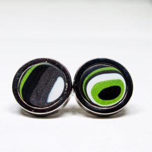 Colorful abstract circle earrings on white background.