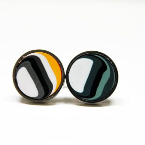 Colorful round earrings with abstract patterns.