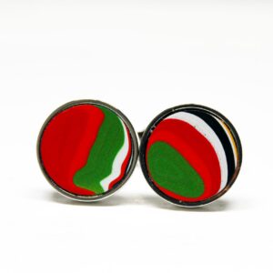 Colorful round cufflinks with abstract design.