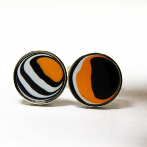 Round earrings with abstract orange pattern.
