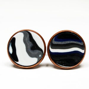 Abstract circular earrings with black and white.