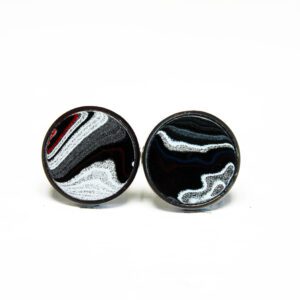 Black and white round gemstone earrings.