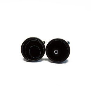 Black circular objects on white background.