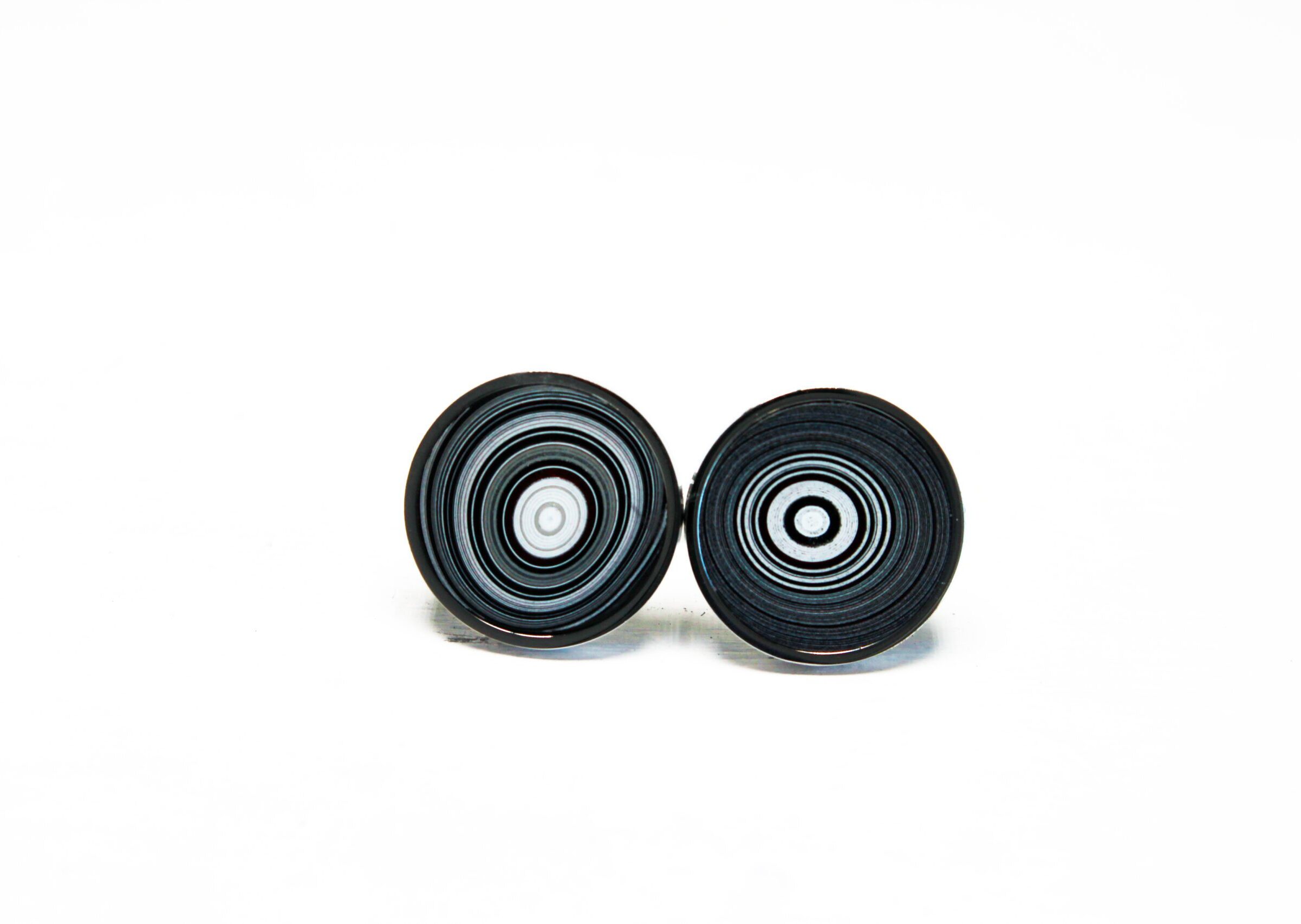Black and white concentric circle earrings.