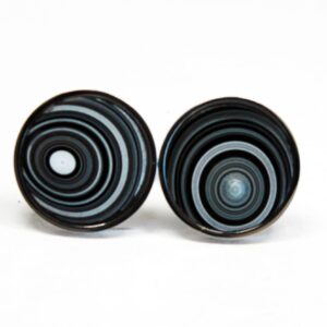 Black and white concentric circle earrings.