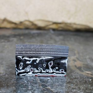 Finished Piece of Fordite - 61.2mm x 36.91mm x 15.48mm          (3087)