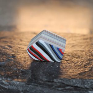 Finished Piece of Fordite - 22.36mm x 15.21mm x 14.88mm     (F-017)