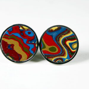 Colorful round earrings with abstract patterns.