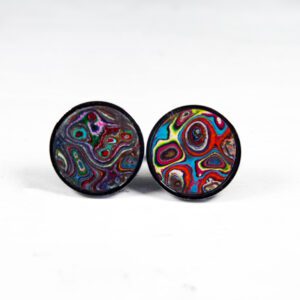 Colorful round earrings with abstract patterns.