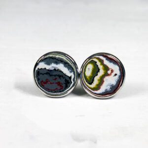 Colorful agate stone earrings on white background.