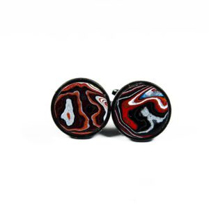 Colorful swirl design cufflinks on white background.