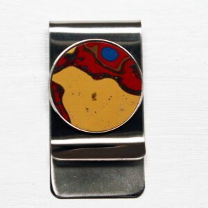 Metal money clip with colorful stone design.