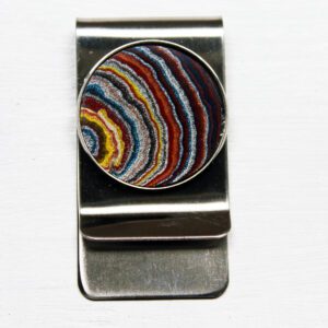 Metal money clip with colorful circular design.