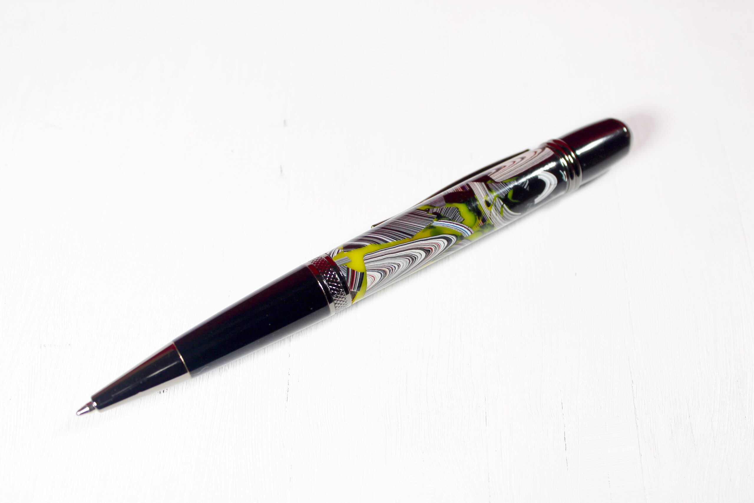 Decorative pen with colorful, intricate design.
